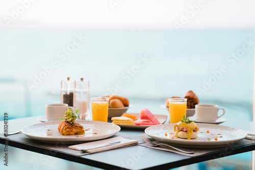 Close-up of food and drink served on table at restaurant
