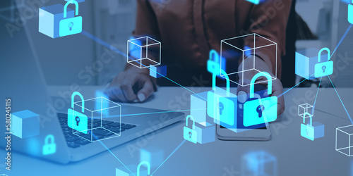 Woman hands with phone and computer on desk, data protection and cybersecurity