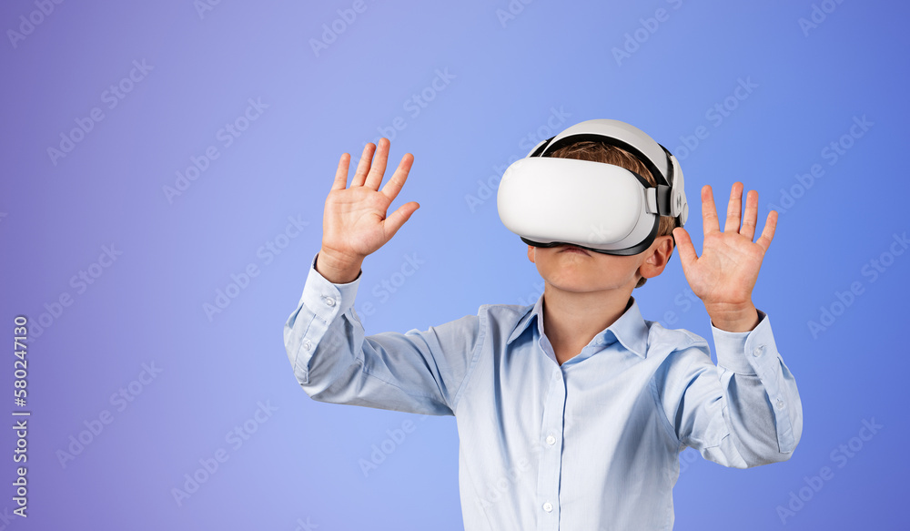 Boy in vr glasses hands touching something on gradient copy spac Boy in vr glasses hands touching something on gradient copy spac