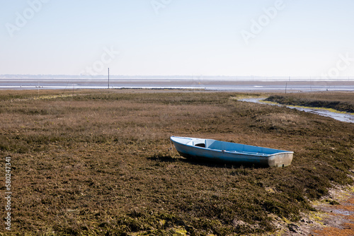 little boat on low tide in bassin Arcachon bay in France