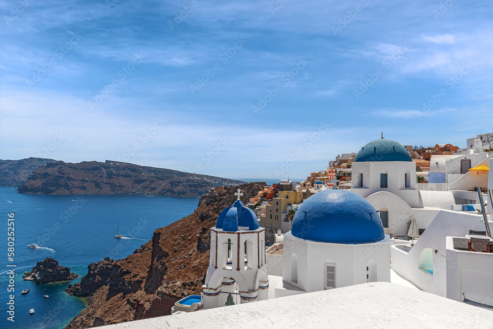 View of the blue domes in Oia. Santorini. Greece.