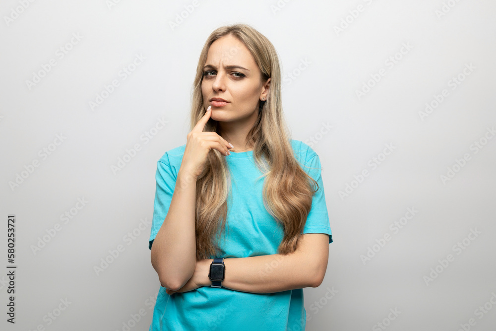 woman showing doubt and uncertainty on white background woman showing doubt and uncertainty on white background