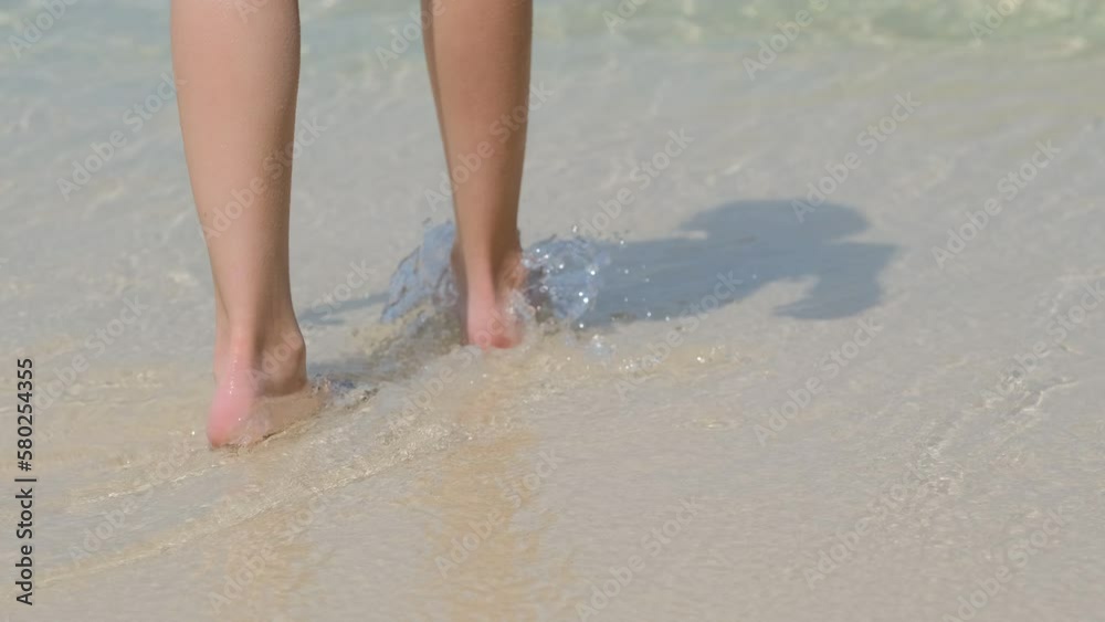 warm sea and hot summer, swimming in the sea, feet in the sea warm sea and hot summer, swimming in the sea, feet in the sea