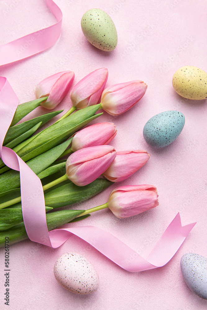 Pink tulips and Easter eggs background