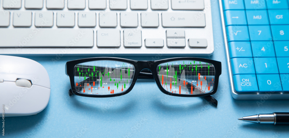 Stock market statistics on eyeglasses. Forex trading analysis Stock market statistics on eyeglasses. Forex trading analysis