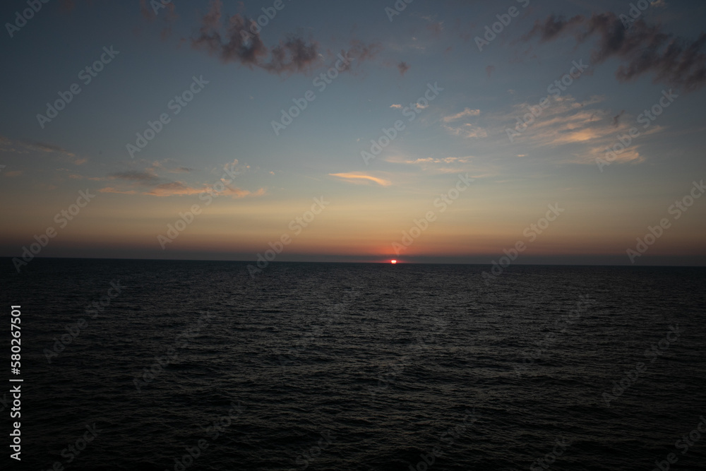 sunset on the sea sky with clouds of twilight in nature