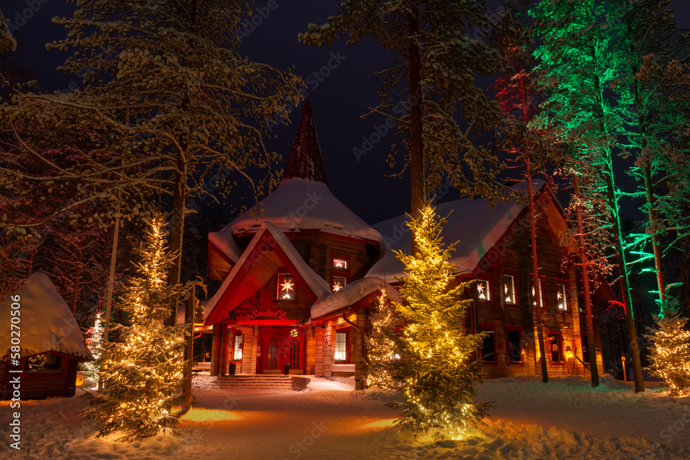 Ταπετσαρία Rovaniemi, Finland - 20 February 2023 Illuminated house in the Santa Clause Vill