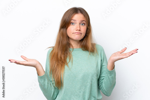 Young caucasian woman isolated on white background making doubts gesture