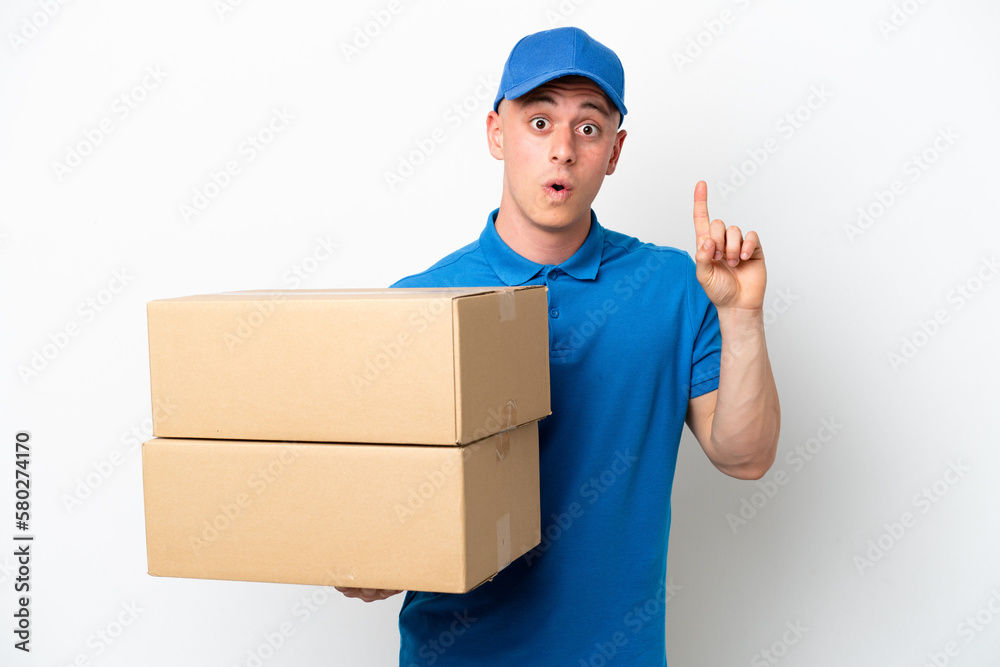 Young delivery Brazilian man isolated ops white background intending to realizes the solution while lifting a finger up Young delivery Brazilian man isolated ops white background intending to realizes the solution while lifting a finger up