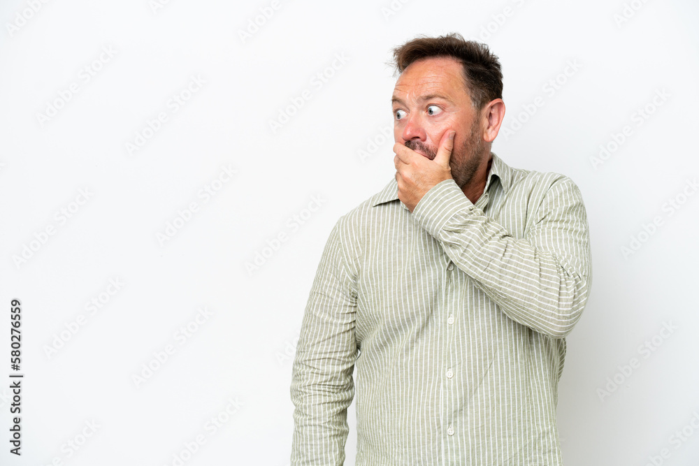 Middle age caucasian man isolated on white background doing surprise gesture while looking to the side Middle age caucasian man isolated on white background doing surprise gesture while looking to the side