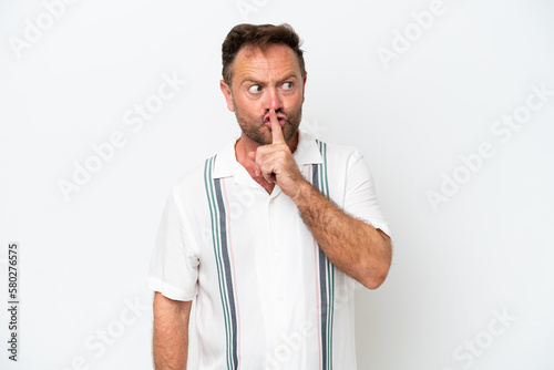 Middle age caucasian man isolated on white background showing a sign of silence gesture putting finger in mouth