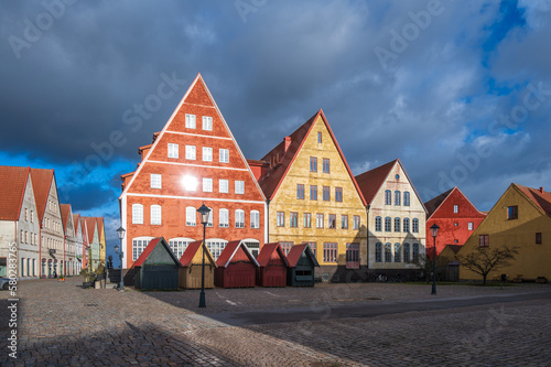 Dramatic sky over medieval looking architecture in Jakriborg Sweden on cold winter day