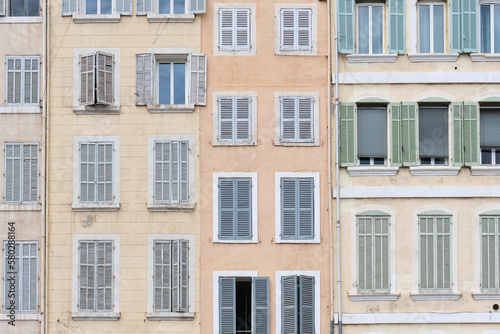 facade of some classical buildings in the center of Marseille, France