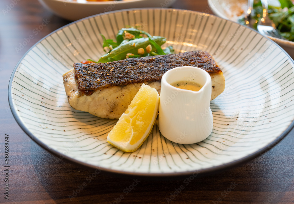 Sea bass Fish Steak with Lemon Sauce and Salad