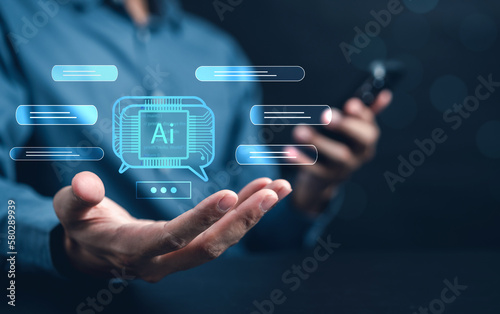 Businessman using chat bot in smartphone intelligence Ai. Chat with AI Artificial Intelligence, developed by OpenAI generate. Futuristic technology, robot in online system...