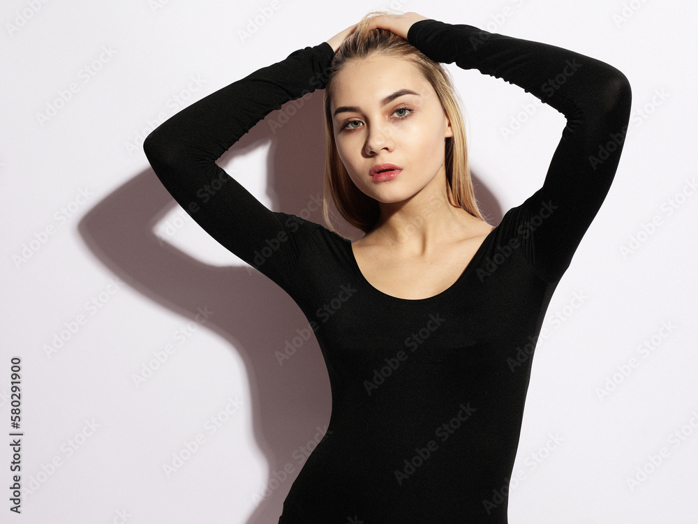Fashion Model, Fashion concept. Young woman posing over white background. Fashion Model, Fashion concept. Young woman posing over white background.