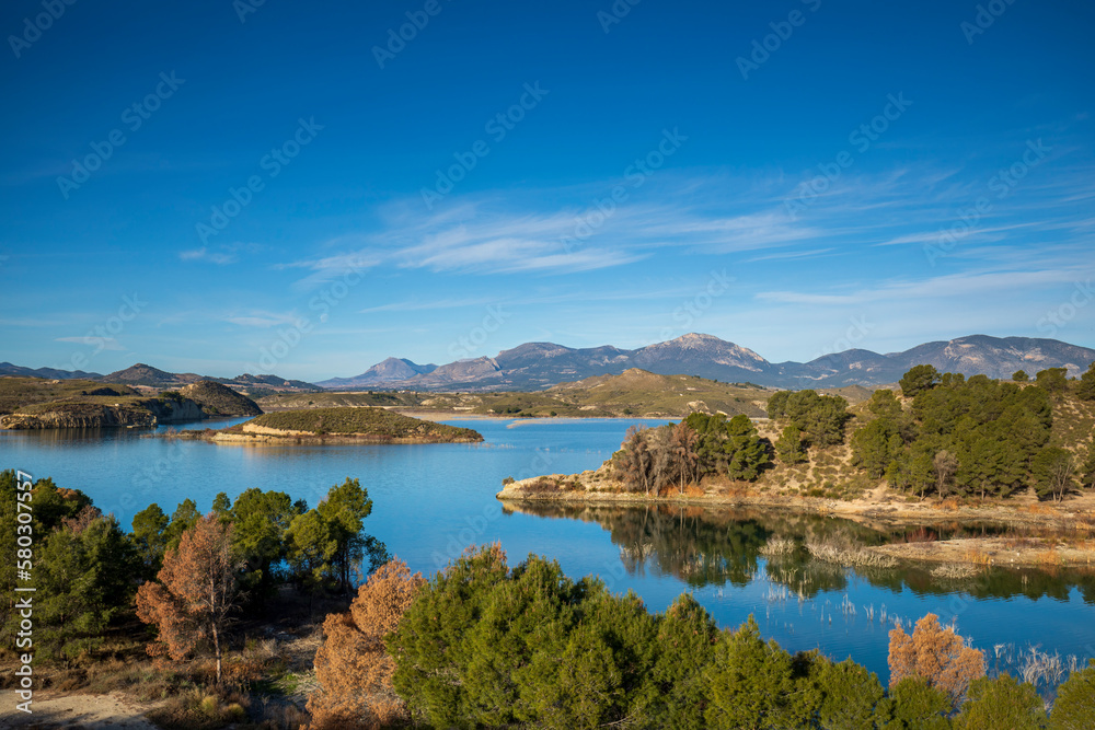 Panoramic view on a bright spring day of the Puentes reservoir, in Lorca, Region of Murcia, Spain.