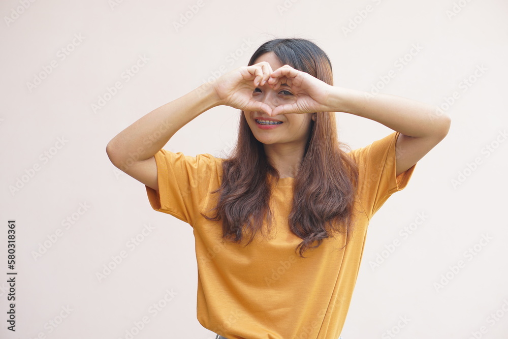 Fototapeta premium Asian woman smiles happily, brightly, cute