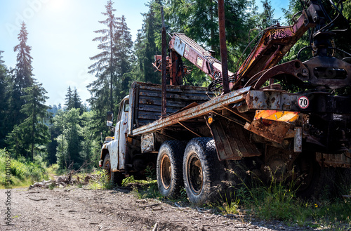 Old forest machine polluting the environment in the forests.