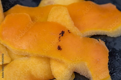 peeled with a thin layer of ripe persimmon peel photo