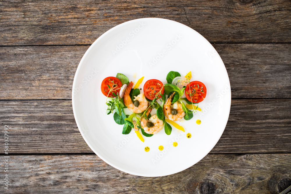 Prawn salad on wooden table
Prawn salad on wooden table