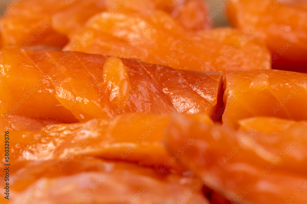 Sliced red trout meat with sea salt Sliced red trout meat with sea salt