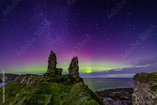 Dunseverick Castle and the Aurora Borealis, Northern Lights, Giants Causeway coastal route, County Antrim, Northern Ireland photo