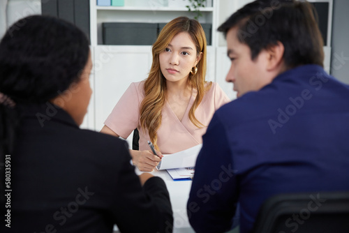 businesswoman meeting and talking about work or project with colleague in the office