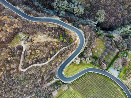 Aerial view of curvy mountain road. © Daniele