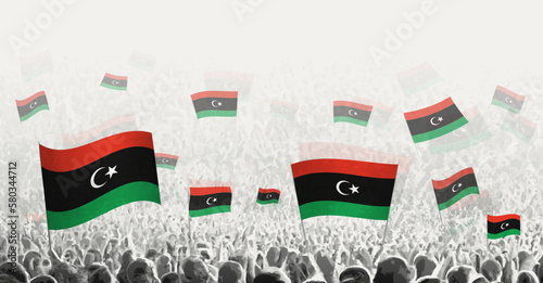 Abstract crowd with flag of Libya. Peoples protest, revolution, strike and demonstration with flag of Libya.