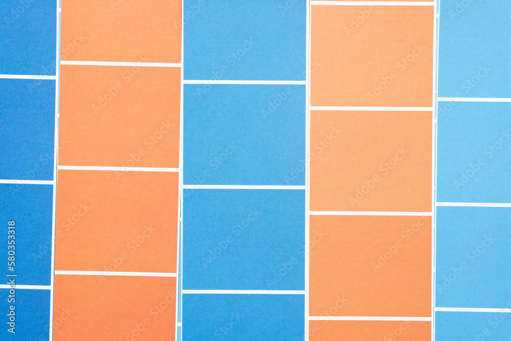 abstract background with paper stripes and grid pattern in orange and blue