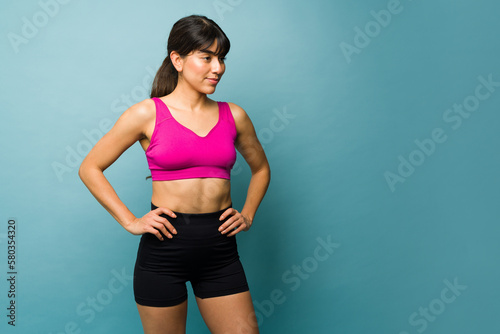 Active young woman in sportswear happy about training