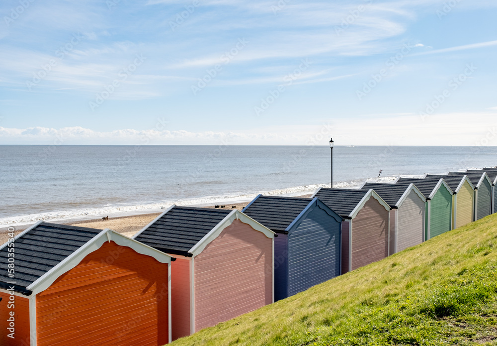 Colourful beach huts on the promenade or esplanade in the seaside town of Gorleston on the Norfolk coast Colourful beach huts on the promenade or esplanade in the seaside town of Gorleston on the Norfolk coast