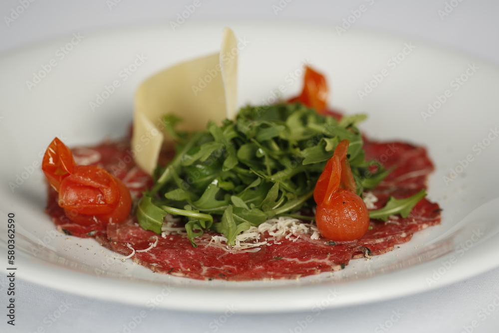 Raw meat salad and cheese dish Raw meat salad and cheese dish