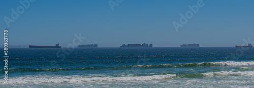 Obraz na płótnie Container ship from shipping company Hamburg Sued and MAERSK Line with container anchored off Cape Town w salonie
