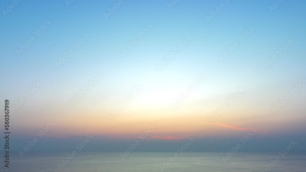 aerial hyperlapse lapse view sweet sky in sunset above the sea at Karon beach Phuket..Gradient color. Sky texture, abstract nature background..Sunset with strong color clouds light rays aerial hyperlapse lapse view sweet sky in sunset above the sea at Karon beach Phuket..Gradient color. Sky texture, abstract nature background..Sunset with strong color clouds light rays