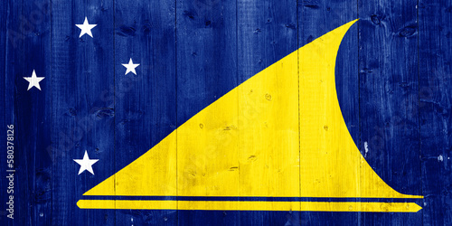 Flag of Tokelau on a textured background. Concept collage.