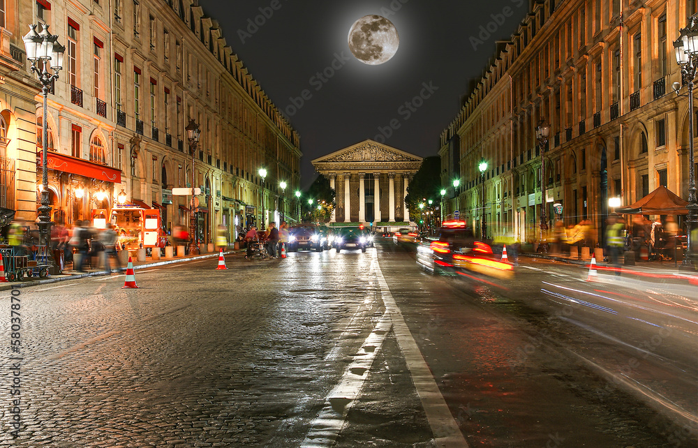 Night view of the Roman Catholic church Madelein (with the moon), Paris, France