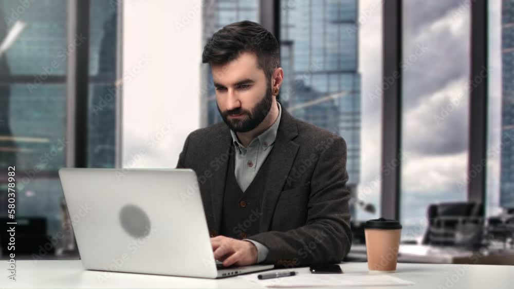 Business man working laptop desk browsing internet information workplace office skyscraper downtown