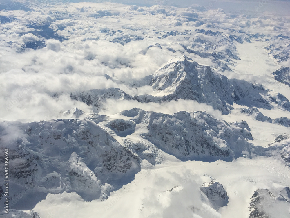 Flying Over Mt Mckinley, Now Mt Denali. Snow covered mountain peaks.