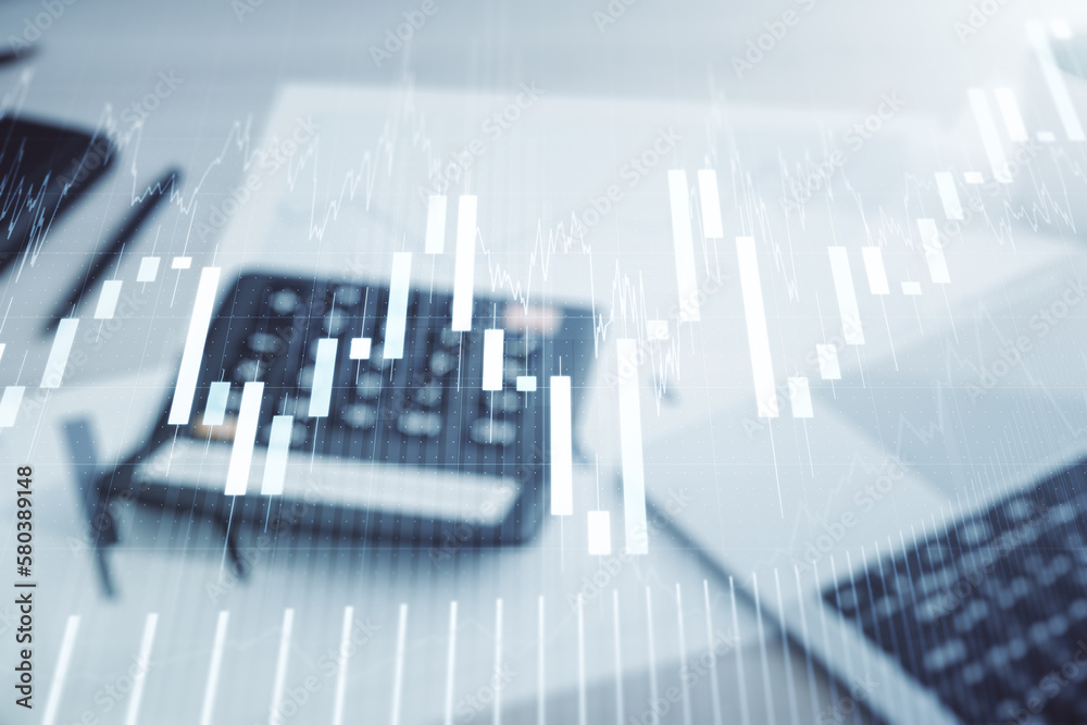 Multi exposure of virtual abstract financial graph interface on blurry calculator and computer background, financial and trading concept Multi exposure of virtual abstract financial graph interface on blurry calculator and computer background, financial and trading concept