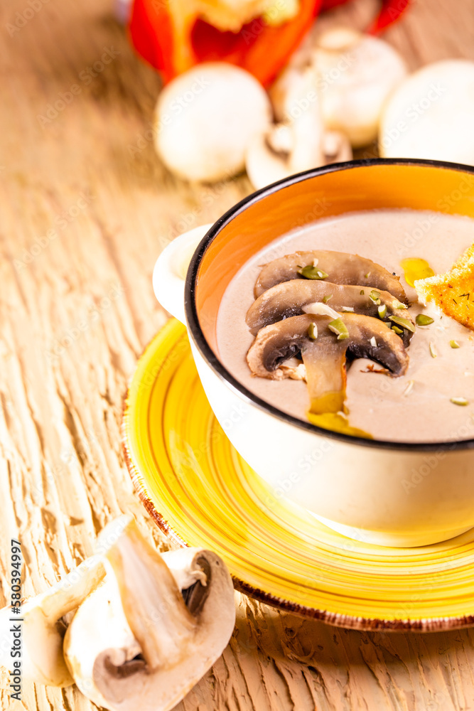 mushroom soup in a plate on the table in a restaurant mushroom soup in a plate on the table in a restaurant