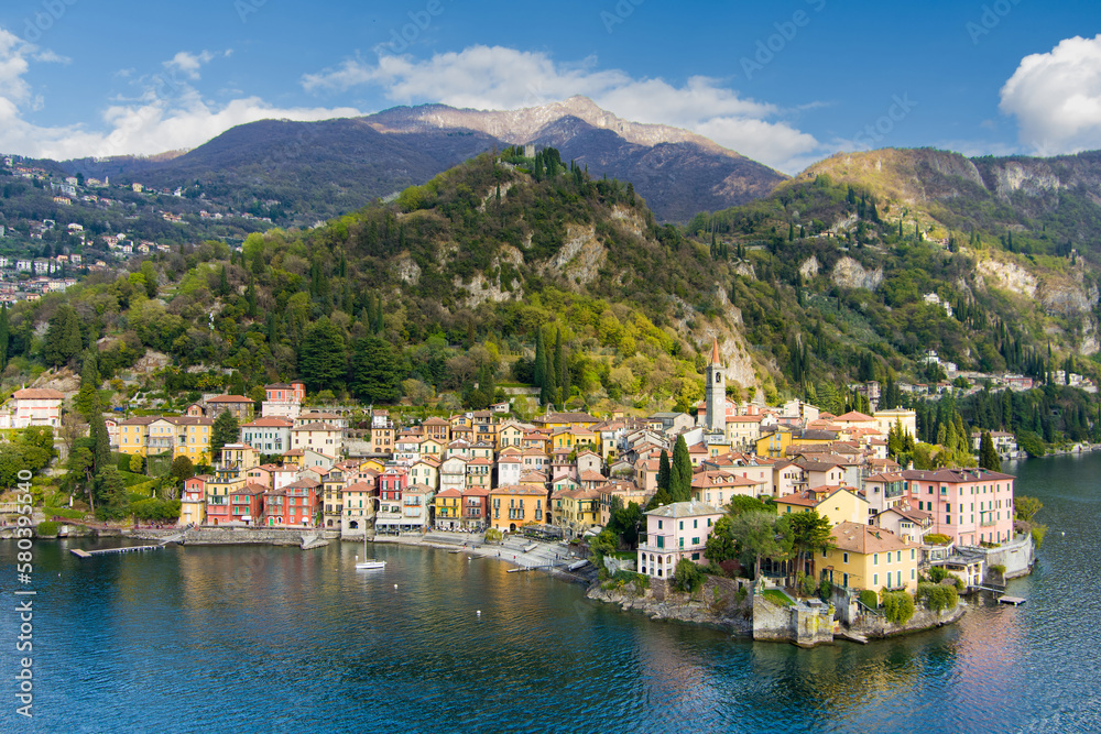 Beautiful aerial waterfront cityscape of Varenna, one of the most picturesque towns on the shore of Lake Como. Charming location with typical Italian atmosphere. Varenna, Italy.