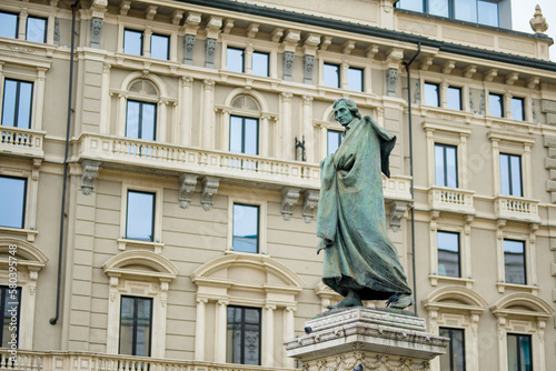 Monument to Italian writer and poet Giuseppe Parini on Piazza Cordusio in Milan, Italy