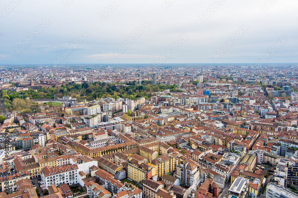 Aerial view of Milan skyline with modern skyscrapers in Porto Nuovo business district, Italy. Panorama of Milano city. Spring panoramic view of Milan from above. Milan, Italy.