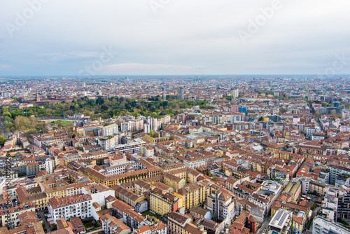 Aerial view of Milan skyline with modern skyscrapers in Porto Nuovo business district, Italy. Panorama of Milano city. Spring panoramic view of Milan from above. Milan, Italy.