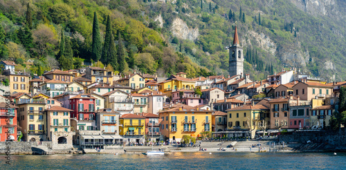 Typical colorful houses in Varenna, one of the most picturesque towns on the shore of Lake Como. Charming location with typical Italian atmosphere. © MNStudio