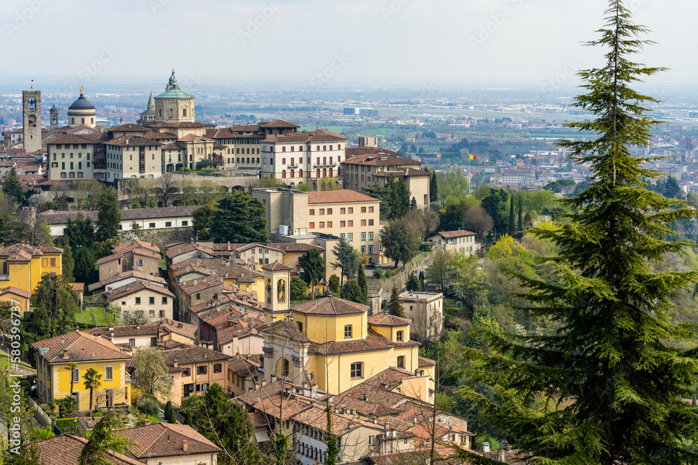 Scenic view of Bergamo city northeast of Milan. Citta Alta, town's upper district, known by cobblestone streets and encircled by Venetian walls. Bergamo, Italy.