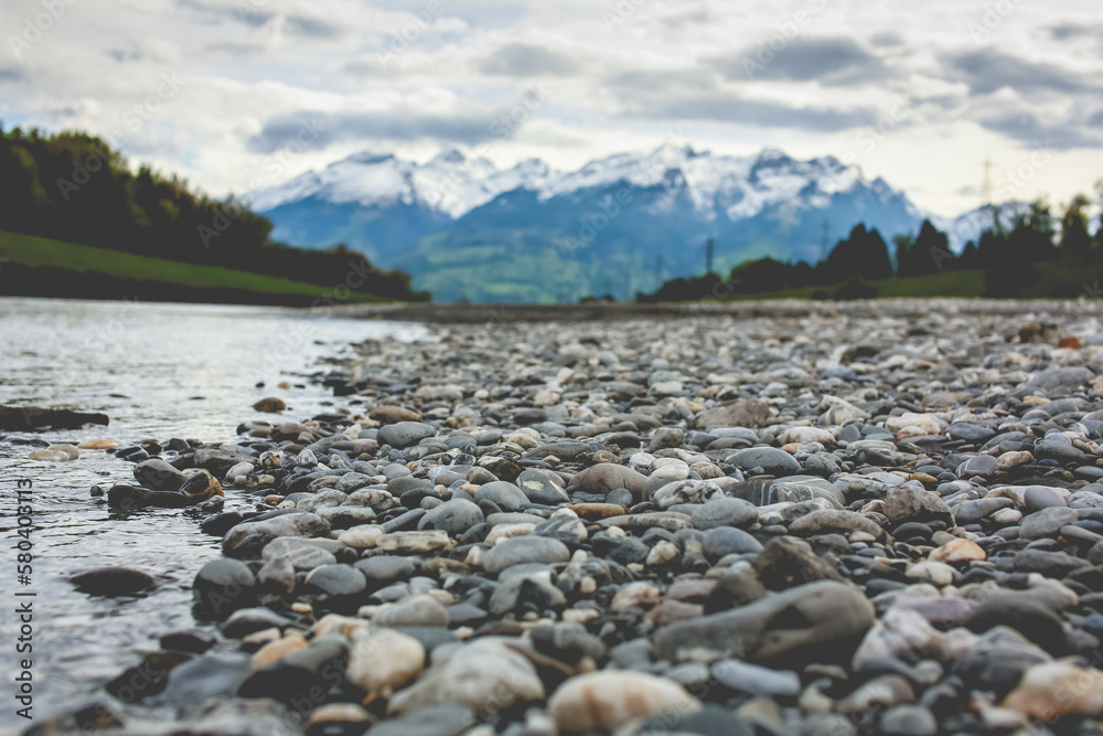 Pebbles and rocks on a mountain river bank