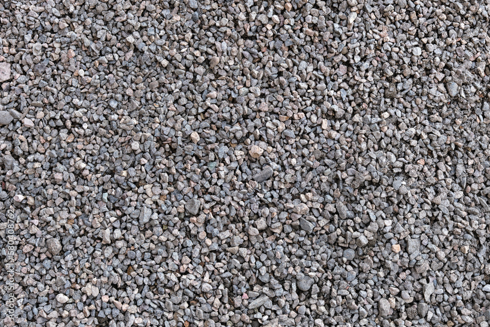 Close-up abstract background of finely crushed stone. Close-up abstract background of finely crushed stone.